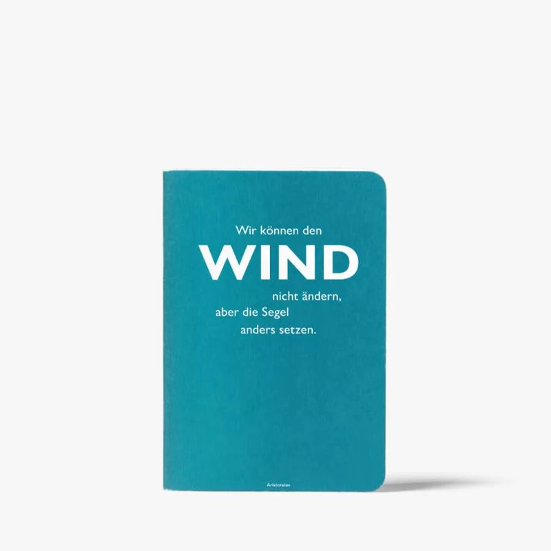 Notizheft "Wir können den Wind nicht ändern, aber die Segel anders setzen"